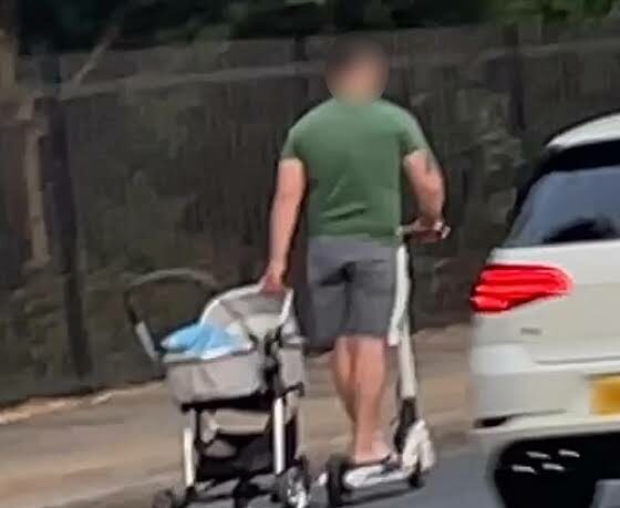 E-scooter Riding Man Spotted Towing A PRAM Down Busy Road