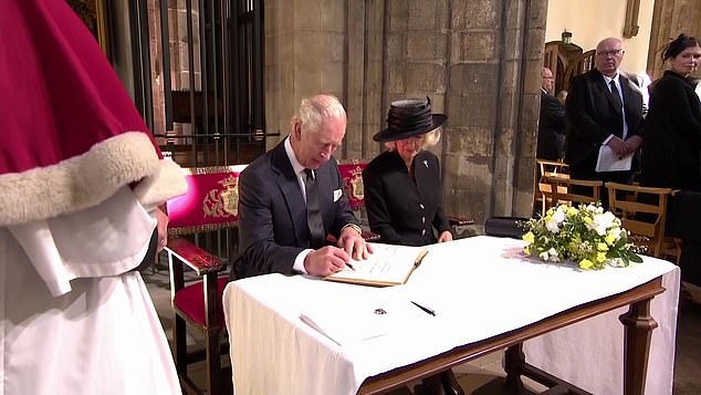 King Charles Appears To Bring His Own Pen To Sign Visitors' Book After Pen Disasters