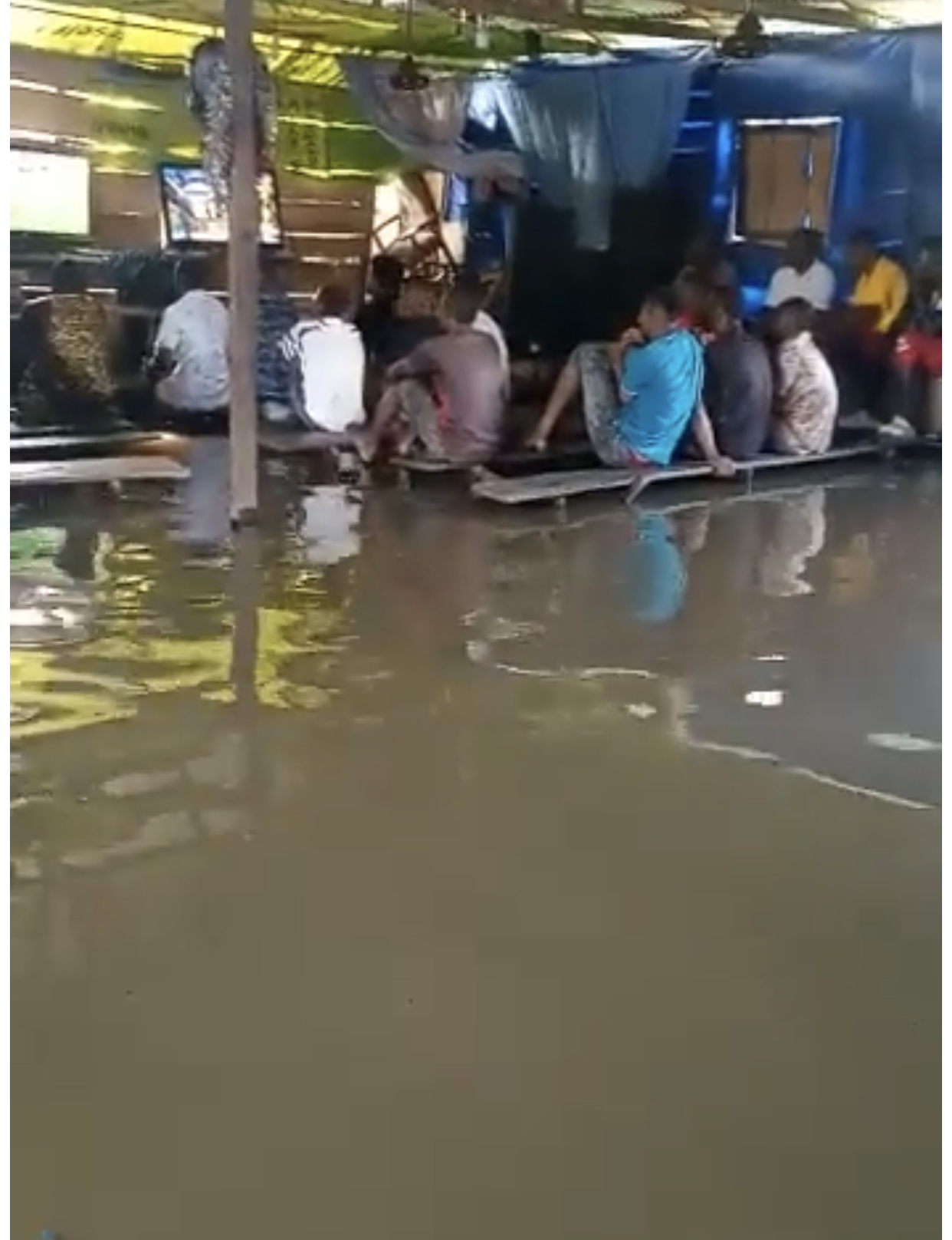 VIDEO: Fans Watch Football Match In A Flooded Viewing Centre