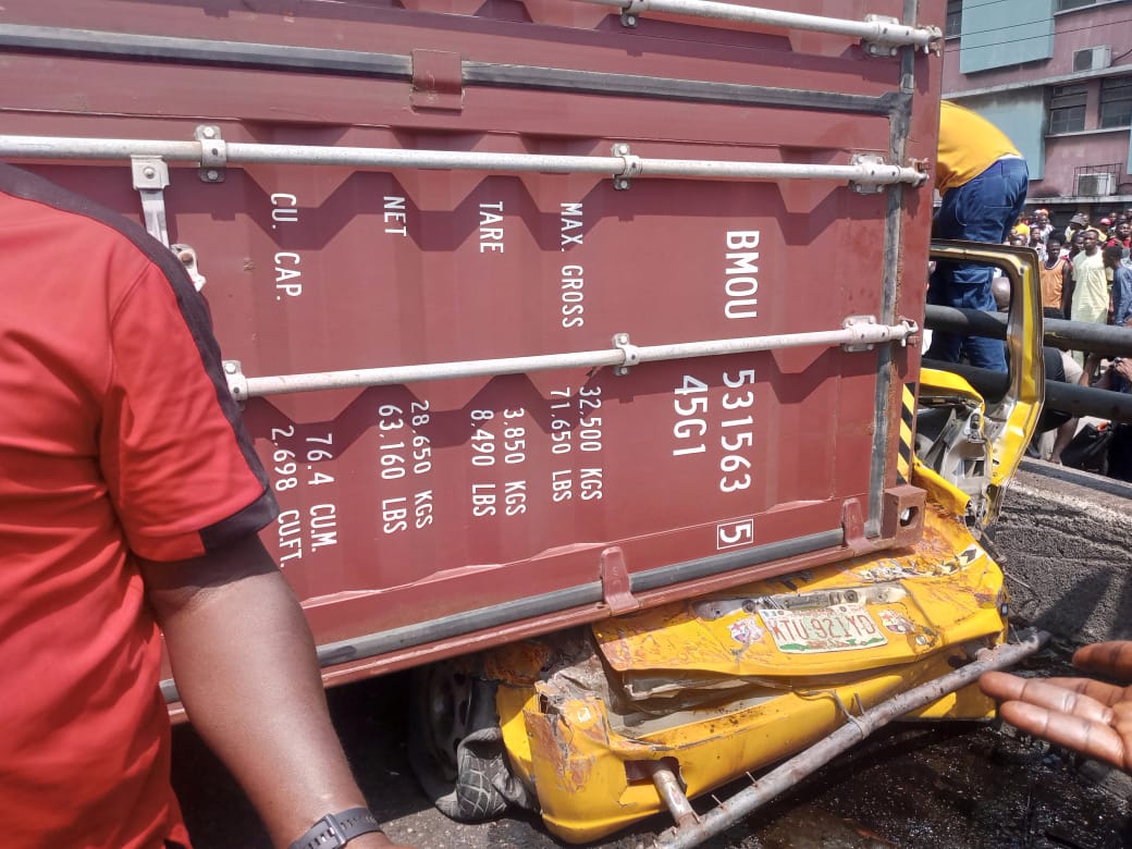 Container Falls On Commercial Bus At Ojuelegba Bridge
