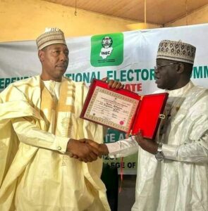 Expect More Development Projects -Gov. Zulum Assures Borno People By Gbenga Akingbule. Borno State Governor, Prof. Babagana Zulum, on Thursday, assured the citizens of the State of more people-oriented projects as he prepares to govern the State for a second term.  Gatekeepers News reports that Prof Zulum gave the assurance on Thursday at an occasion in Maiduguri, the State capital, where the Independent National Electoral Commission (INEC) presented his certificate of return to him having won the governorship election on the platform of the All Progressives Congress  (APC) on March 18th.INEC’s National Commissioner in charge of Bauchi, Borno and Yobe States, Major General Madibbo Alkali (rtd)  also presented certificates of return to the 28 members of the state House of Assembly, all of whom are members of the APC. Zulum stated that he would have no time to waste and promised to hit the ground running immediately. The governor revealed that his programmes and policies in his second term would remain focused on security, health, education, agriculture and food security, job creation, youth and women empowerment, urban renewal, flood prevention, rehabilitation and resettlementAccording to governor Zulum, "we will not settle for just good when we can make things better,  and clearly, our aim is to achieve the best. We will not fail in our commitment to you, the people of Borno State and Insha Allah we will keep the promises made ." “I want to assure the people of Borno State that Insha Allah we will not relent in our efforts to reposition Borno State to greater heights. I will commit to making sure that insha’Allah, we will work 100% for the benefit of the citizens of Borno State.” Zulum said. Prof Zulum also seized the opportunity to call on his fellow contestants to join him in the task of taking Borno to greater heights.