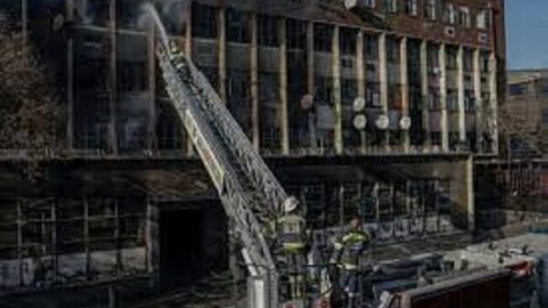 70 Dead As Fire Guts 5-story Building