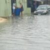 Lagos Seals Building After Residents Dump Waste on Flooded Street