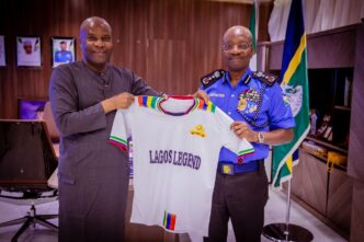 Engr Waidi Akanni (left) presenting a customised jersey of the Lagos Legends to the IGP Kayode Egbetokun during the courtesy visit to the IGP at the Force Headquarters in Abuja. recently